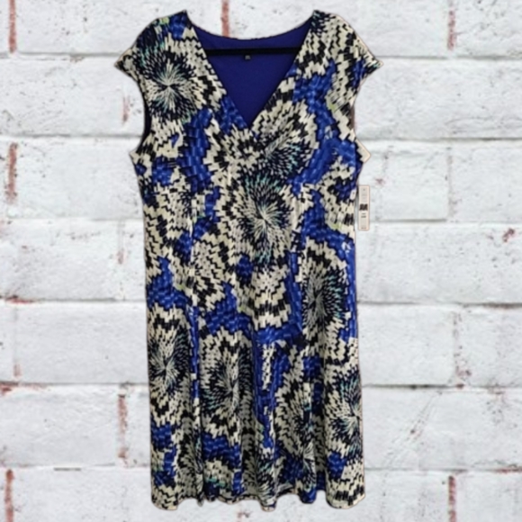 NOT AVAILABLE. Glamour surplice flowy mini dress, bright blue pattern NWT - Picture 1 of 11